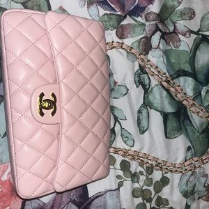 Pink double flap Chanel purse, been worn quite a bit